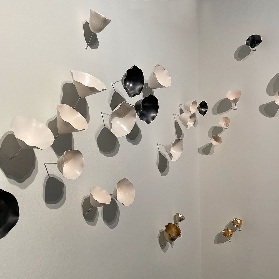 Lucrecia Waggoner, Tulip Field
Natural porcelain, gun metal glaze & moongold leaf, dimensions variable (60x130" as shown)